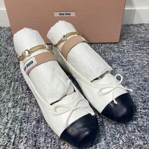 Miu Miu White Leather Ballet Flats with Black Cap Toe and Gold Chain